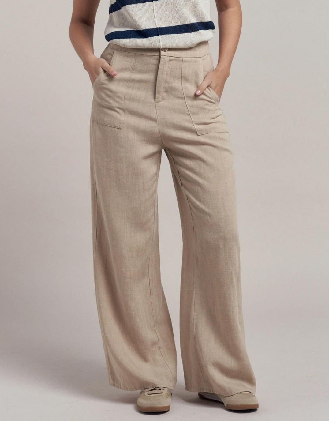 Image of a model wearing Pants. Productname: Billie Pants - in Camel colour by brand - Little Lies