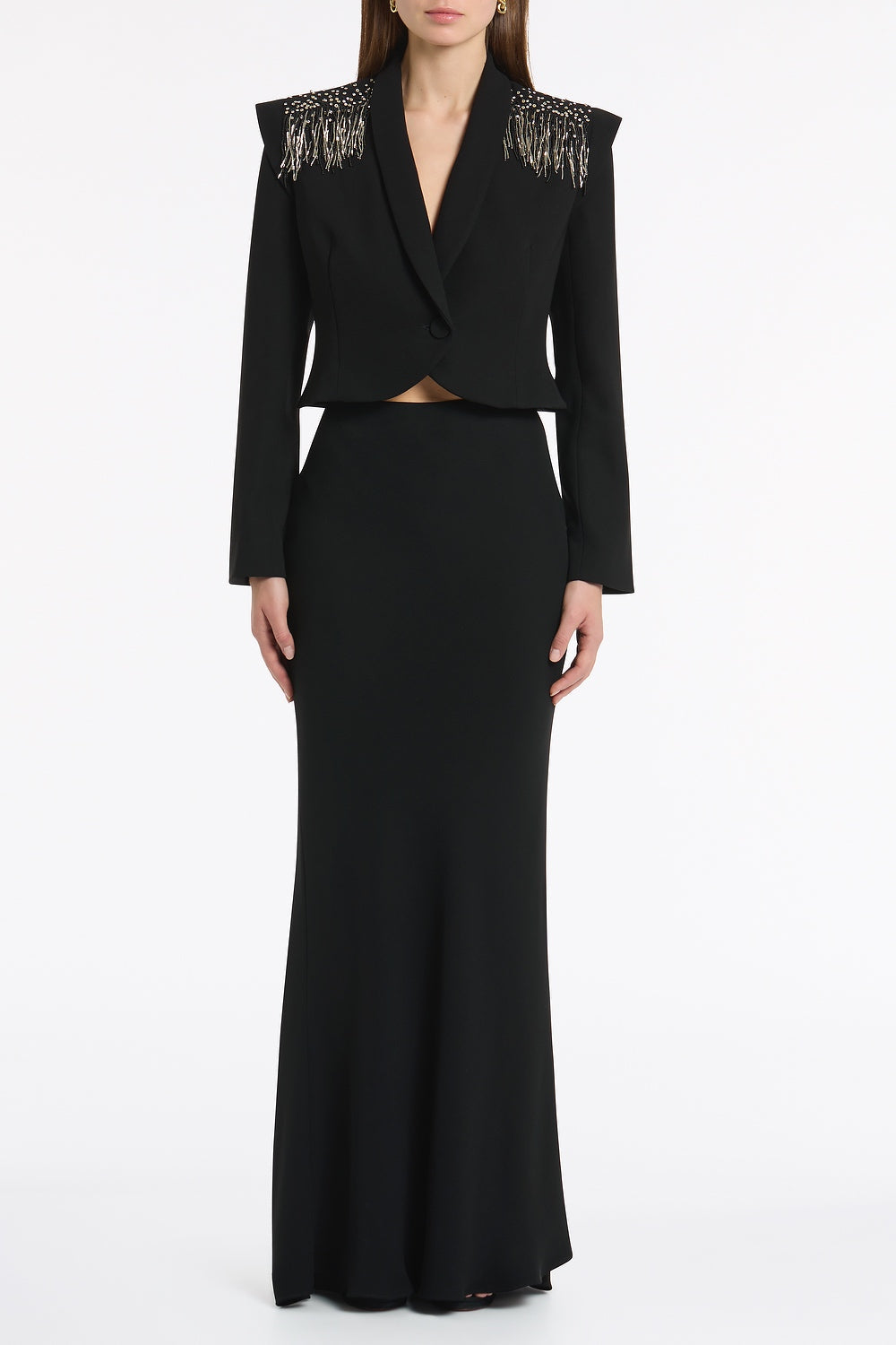 Image of a model wearing Skirts. Product name - Black Crepe Bias Fishtail Skirt in Black colour by brand - Carla Zampatti
