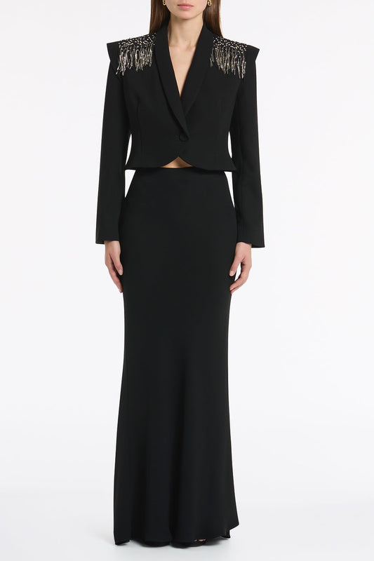 Image of a model wearing Skirts. Product name - Black Crepe Bias Fishtail Skirt in Black colour by brand - Carla Zampatti