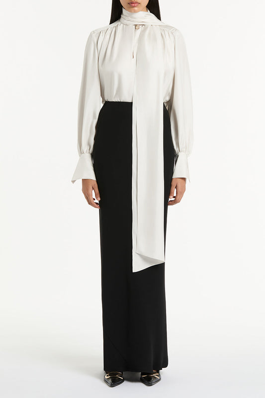 Image of a model wearing Skirts. Product name - Black Crepe Bias Skirt in Black colour by brand - Carla Zampatti