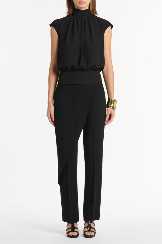 Image of a model wearing Pants. Product name - Black Crepe Drape Front Pant in Black colour by brand - Carla Zampatti