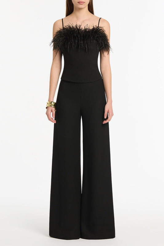 Image of a model wearing Tops. Product name - Black Crepe Feather Top in Black colour by brand - Carla Zampatti