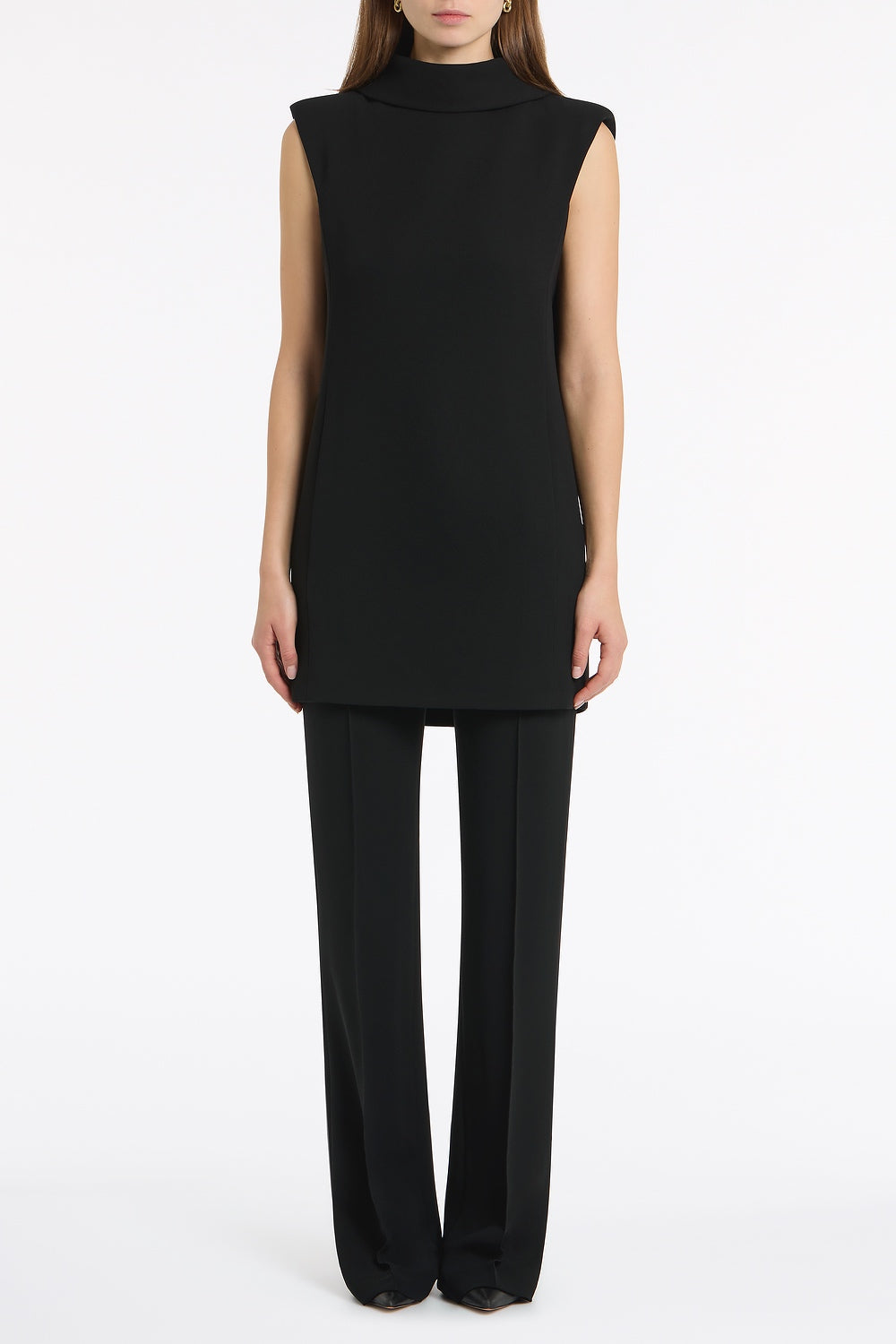 Image of a model wearing Tops. Product name - Black Crepe Folded Collar Tunic in Black colour by brand - Carla Zampatti