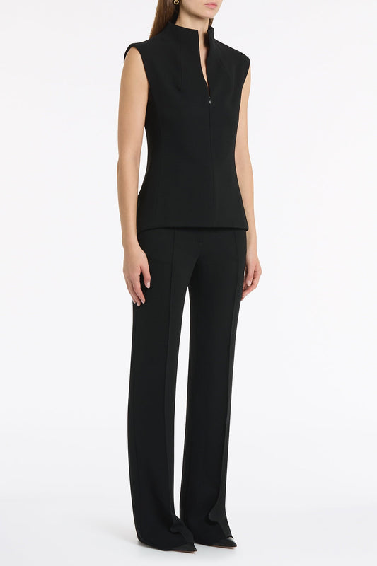 Image of a model wearing Tops. Product name - Black Crepe High Neck Fitted Bodice in Black colour by brand - Carla Zampatti