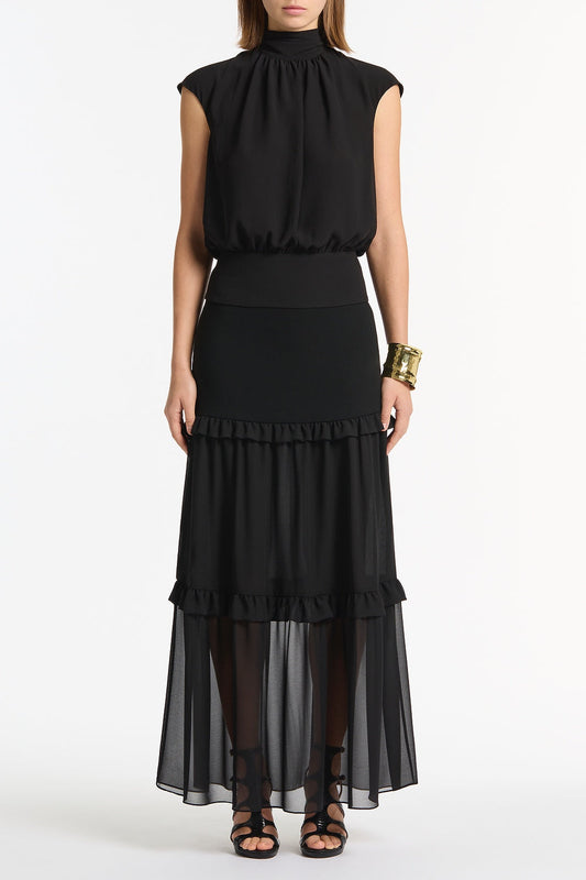 Image of a model wearing Skirts. Product name - Black Crepe Tiered Ruffle Midi Skirt in Black colour by brand - Carla Zampatti