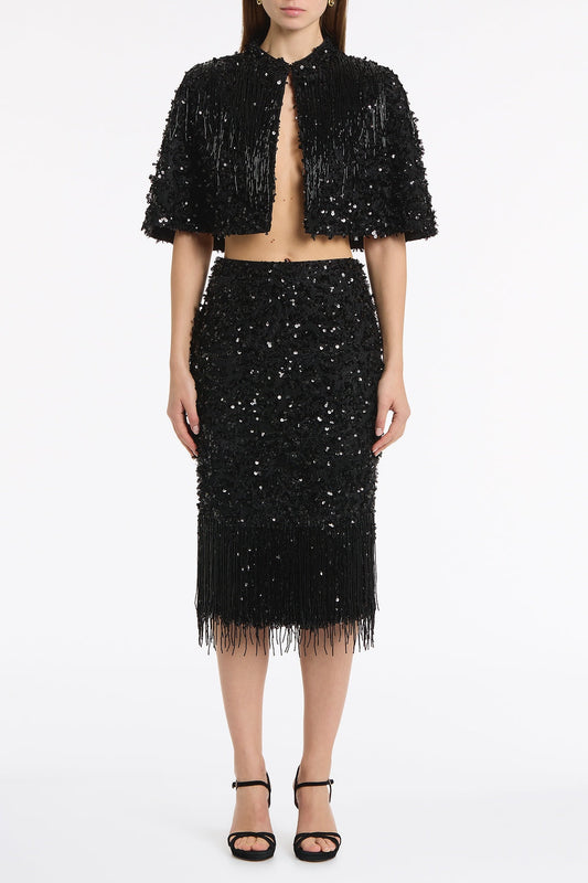 Image of a model wearing Skirts. Product name - Black Fringe Sequin Lace Midi Skirt in Black colour by brand - Carla Zampatti
