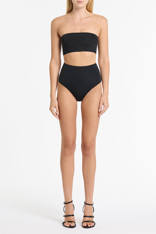 Image of a model wearing Tops. Product name - Black Intima Jersey Waisted High Cut Brief in Black colour by brand - Carla Zampatti
