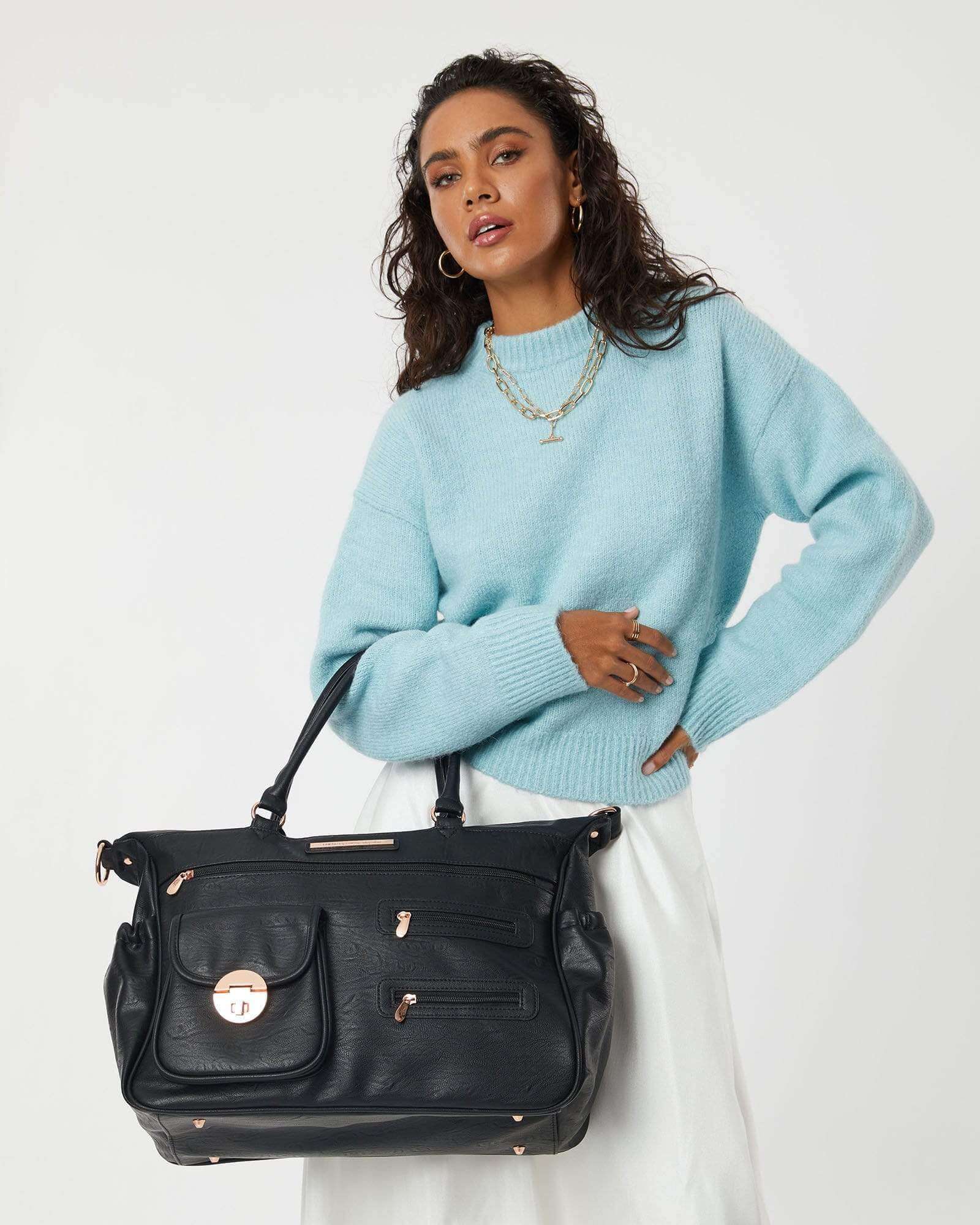Image of Bags. Product name - Black And Rose Gold Pocket Baby Bag in Black colour by brand - Colette by Colette Hayman