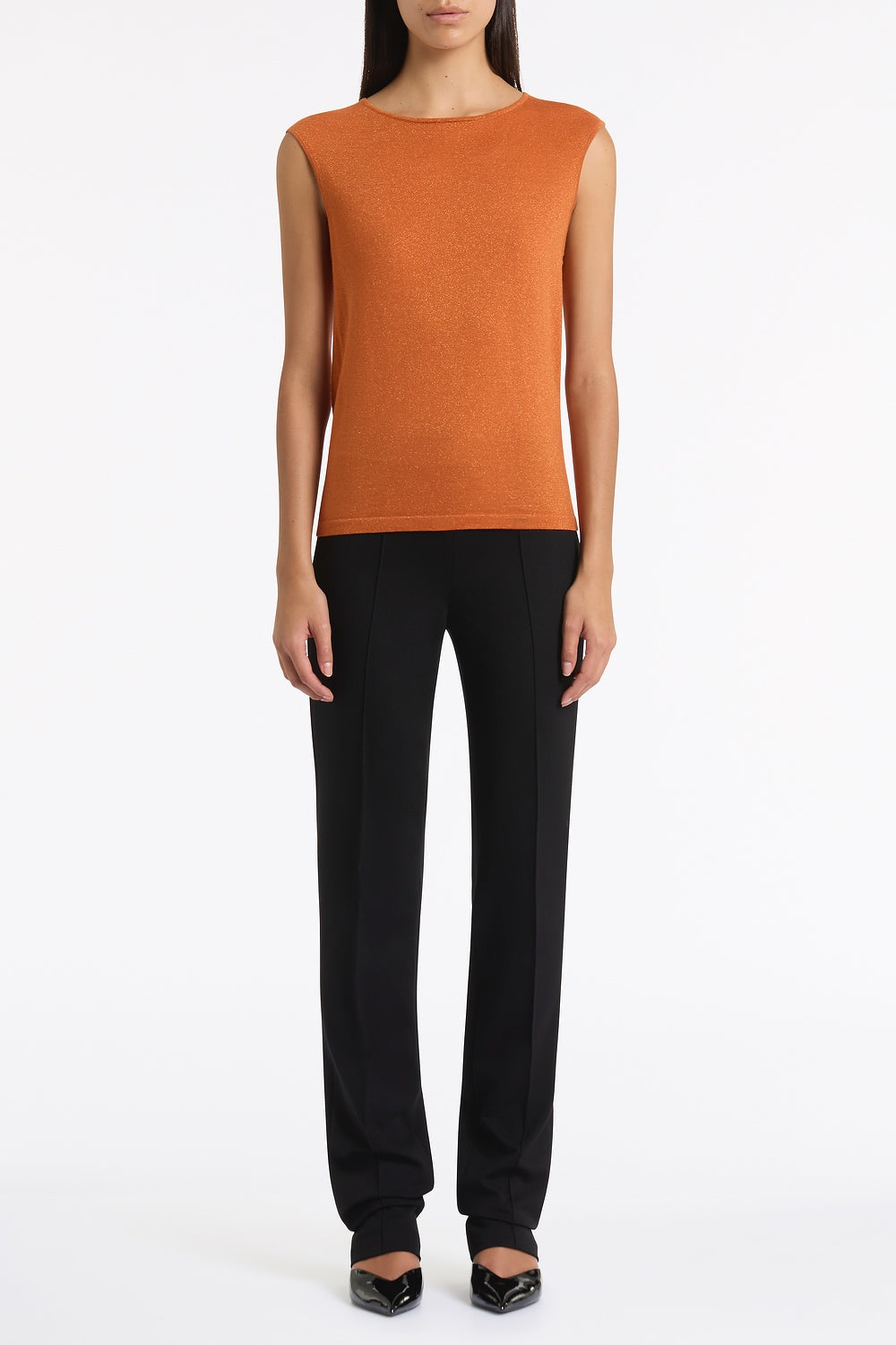 Image of a model wearing Pants. Product name - Black Ponte Pinstitch Slim Leg Pant in Black colour by brand - Carla Zampatti