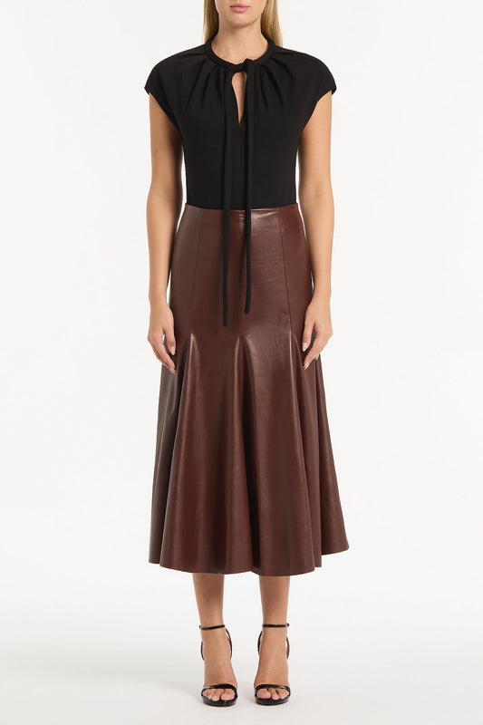 Image of a model wearing Tops. Product name - Black Ponte Tie Detail Top in Black colour by brand - Carla Zampatti