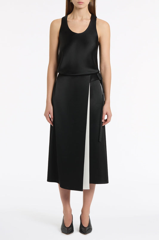 Image of a model wearing Tops. Product name - Black Satin Acetate Racer Tank in Black colour by brand - Carla Zampatti