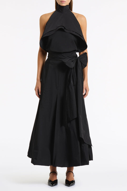 Image of a model wearing Tops. Product name - Black Taffeta Ruffle Bow Detail Top in Black colour by brand - Carla Zampatti