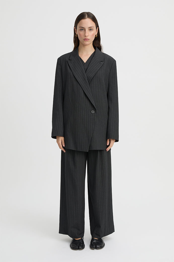 Image of a model wearing Outerwear. Product name - Marina Blazer Charcoal in Charcoal colour by brand - Blanca Studio
