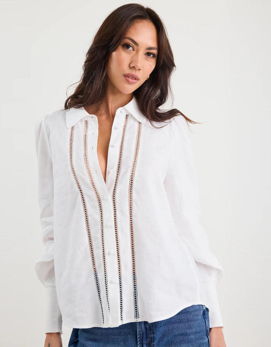 Image of a model wearing Tops. Product name - Zinnia Lace Trim Long Sleeve Shirt White in White colour by brand - By Rosa
