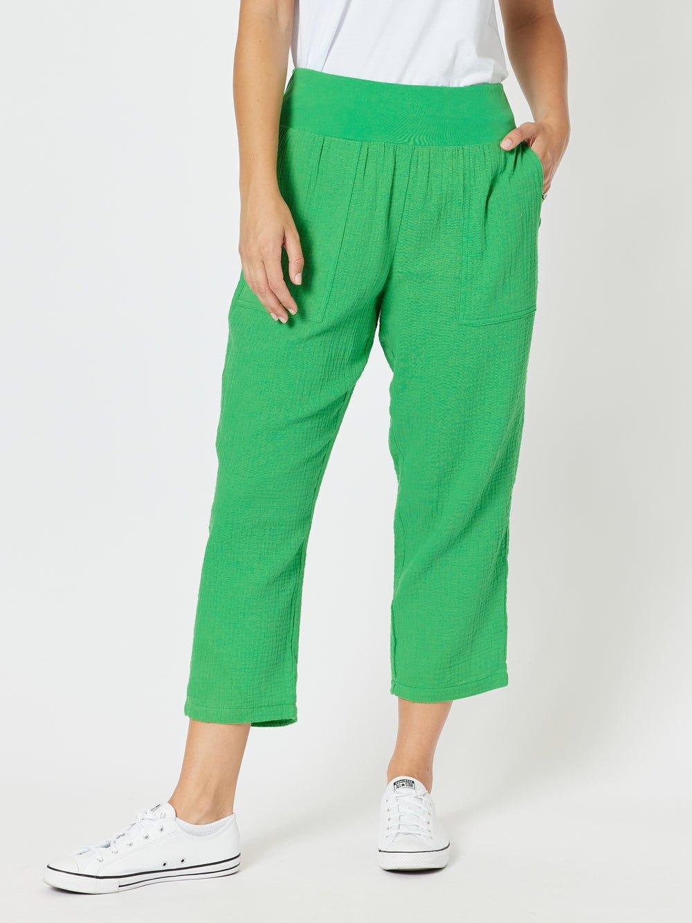 Image of a model wearing Pants. Product name - Byron Cotton 7/8 Pant Emerald in Emerald colour by brand - Threadz
