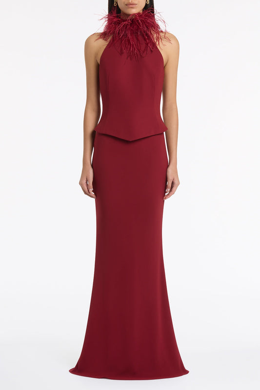 Image of a model wearing Skirts. Product name - Cabernet Crepe Bias Fishtail Skirt in Red colour by brand - Carla Zampatti
