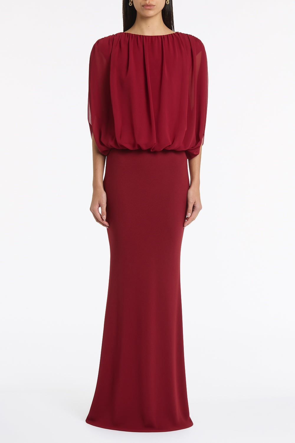 Image of a model wearing Tops. Product name - Cabernet Georgette Gathered Capelet Top in Red colour by brand - Carla Zampatti