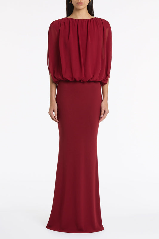 Image of a model wearing Tops. Product name - Cabernet Georgette Gathered Capelet Top in Red colour by brand - Carla Zampatti