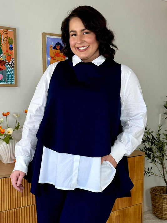Image of a model wearing Tops. Product name - C CAMERON LAYER TOP Navy in Navy colour by brand - Clarity
