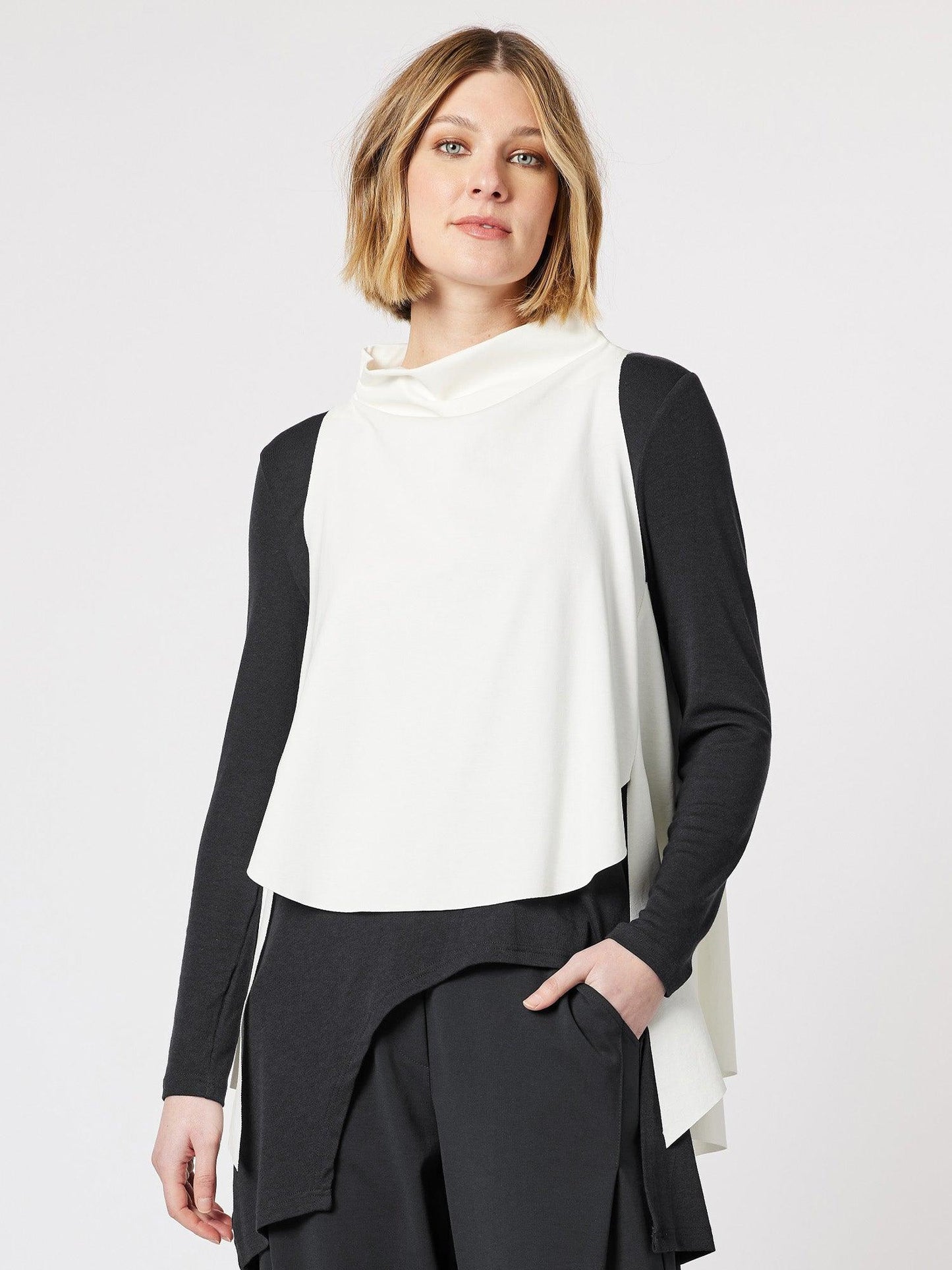Image of a model wearing Tops. Product name - C CAMERON LAYER TOP White in White colour by brand - Clarity