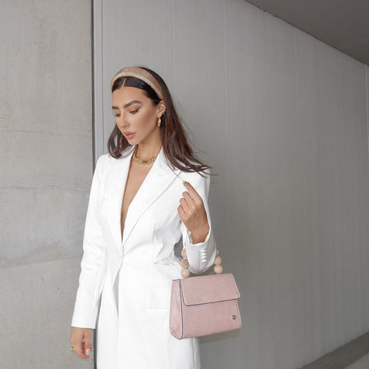 Image of Bags. Productname: CAYLEE Wood Bead Handle Bag in colour by brand - Olga Berg