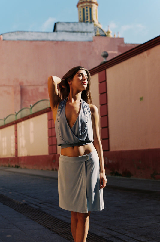 Image of a model wearing Skirts. Product name - Celine Skirt in Pale Blue colour by brand - With Jéan