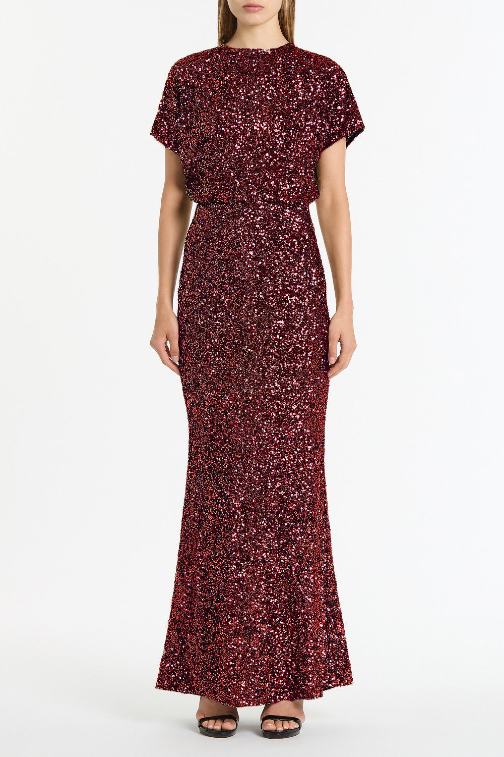 Image of a model wearing Skirts. Product name - Cherry Crushed Sequin Column Skirt in Red colour by brand - Carla Zampatti