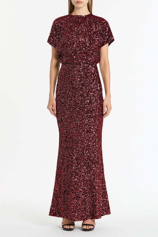 Image of a model wearing Skirts. Product name - Cherry Crushed Sequin Column Skirt in Red colour by brand - Carla Zampatti