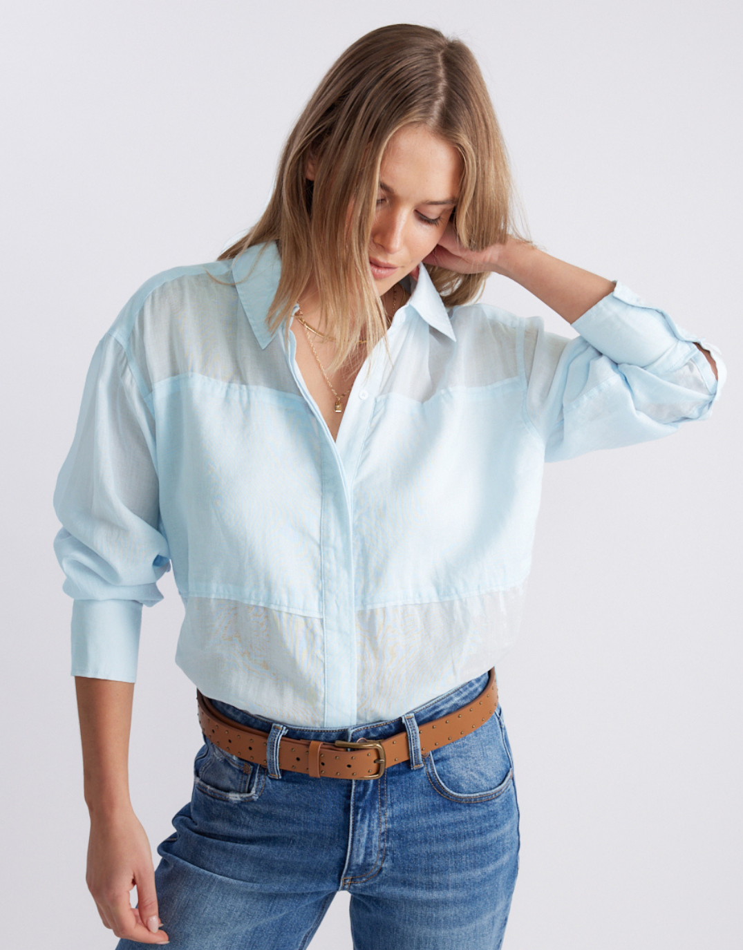 Image of a model wearing Tops. Product name - Chloe Panel Shirt Ice Blue in Ice Blue colour by brand - White & Co.
