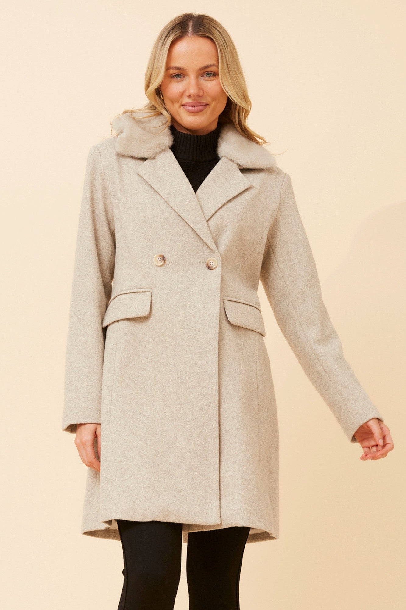 Image of a model wearing Outerwear. Product name - THALIA FAUX FUR TRIM COAT in Pink Marl colour by brand - Caroline Morgan Australia