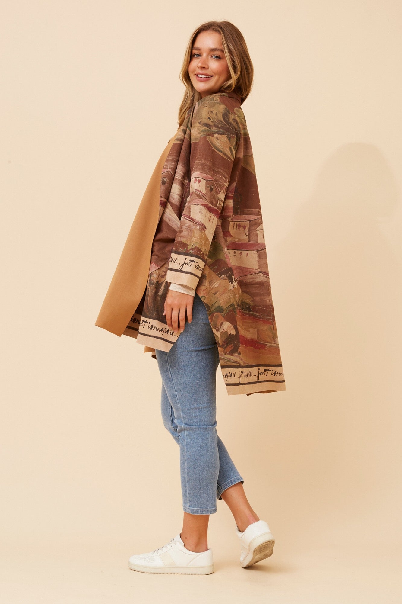 Image of a model wearing Outerwear. Product name - KERENA FAUX SUEDE COAT in Brown colour by brand - BOTTEGA MODA