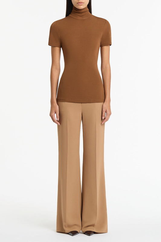 Image of a model wearing Tops. Product name - Cognac Jersey Short Sleeve Top in Brown colour by brand - Carla Zampatti
