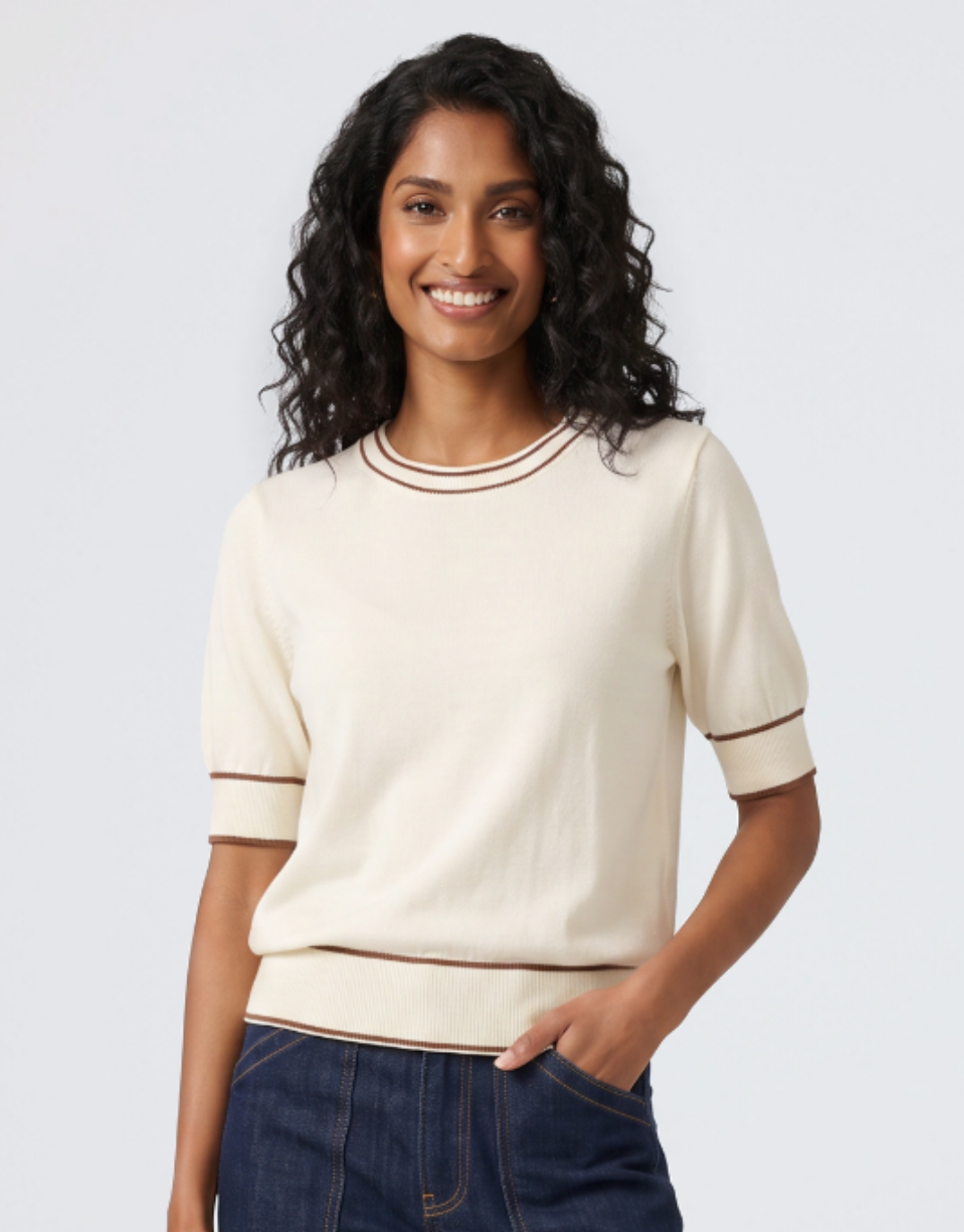 Image of a model wearing Outerwear. Product name - Contrast Trim Knit Top Cream/Caramel in Cream/Caramel colour by brand - Urban Luxury