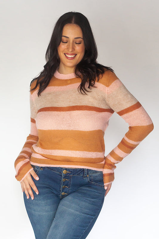 Image of a model wearing Outerwear. Productname: Cowgirl Surfer Hari Pullover Pink in Pink colour by brand - Cowgirl Surfer