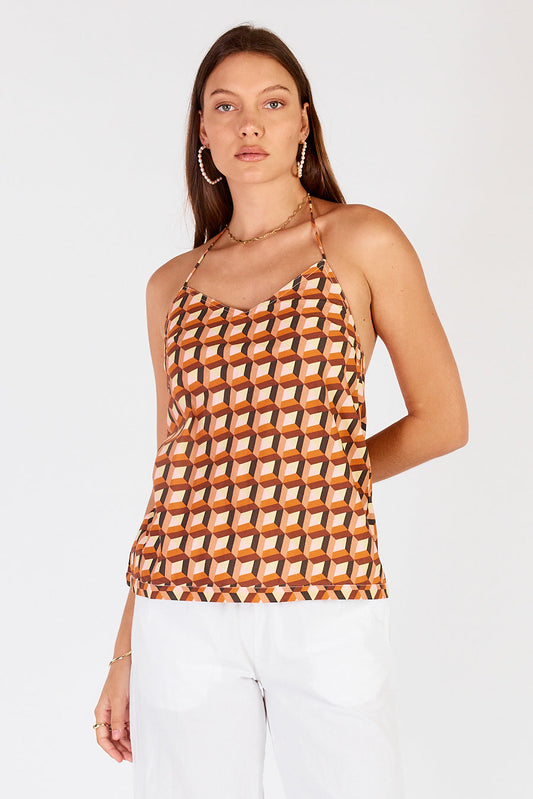 Image of a model wearing Tops. Productname: Cowgirl Surfer Loon Halter Singlet in Singlet colour by brand - Cowgirl Surfer