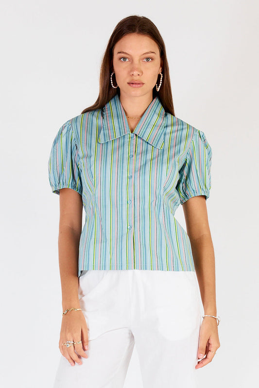 Image of a model wearing Tops. Productname: Cowgirl Surfer Pastille Top Blue in Blue colour by brand - Cowgirl Surfer