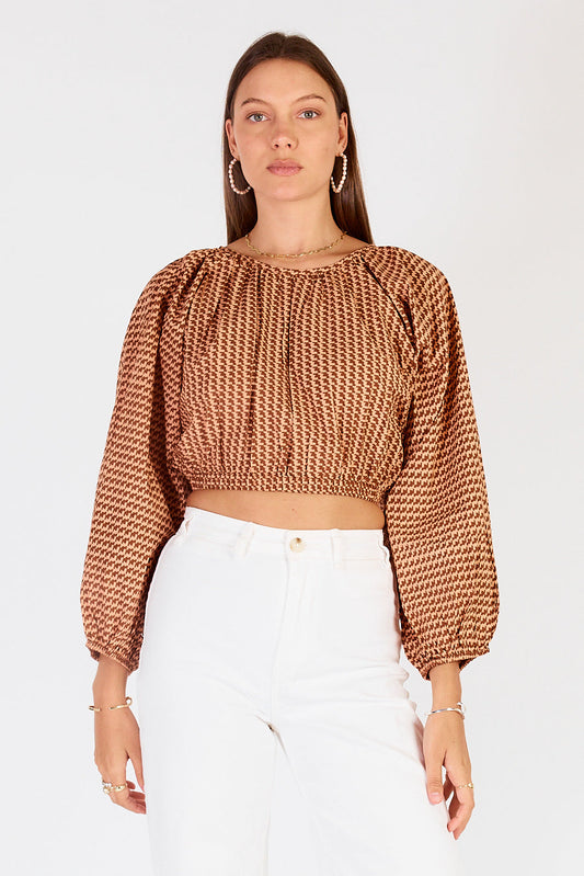 Image of a model wearing Tops. Productname: Cowgirl Surfer Torus Top Chocolate in Chocolate colour by brand - Cowgirl Surfer