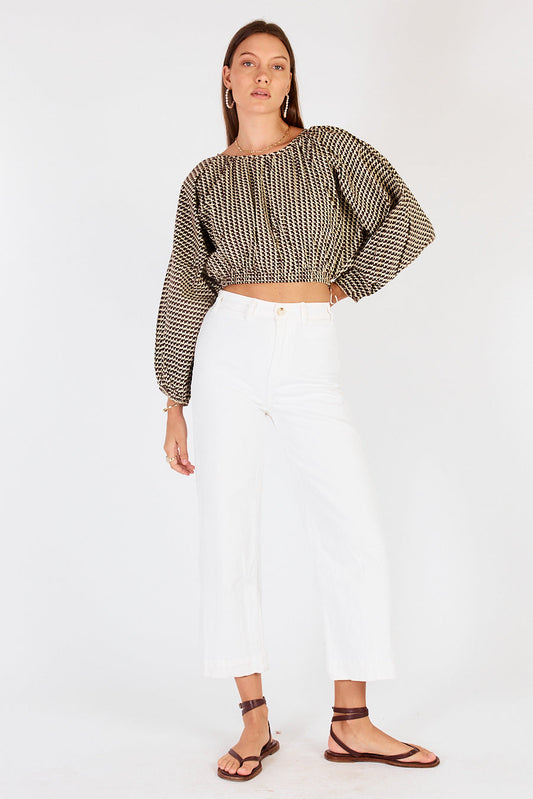 Image of a model wearing Tops. Productname: Cowgirl Surfer Torus Top Green in Green colour by brand - Cowgirl Surfer