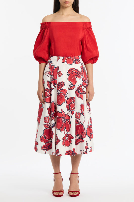 Image of a model wearing Tops. Product name - Crimson Linen Blend Off-Shoulder Top in Red colour by brand - Carla Zampatti