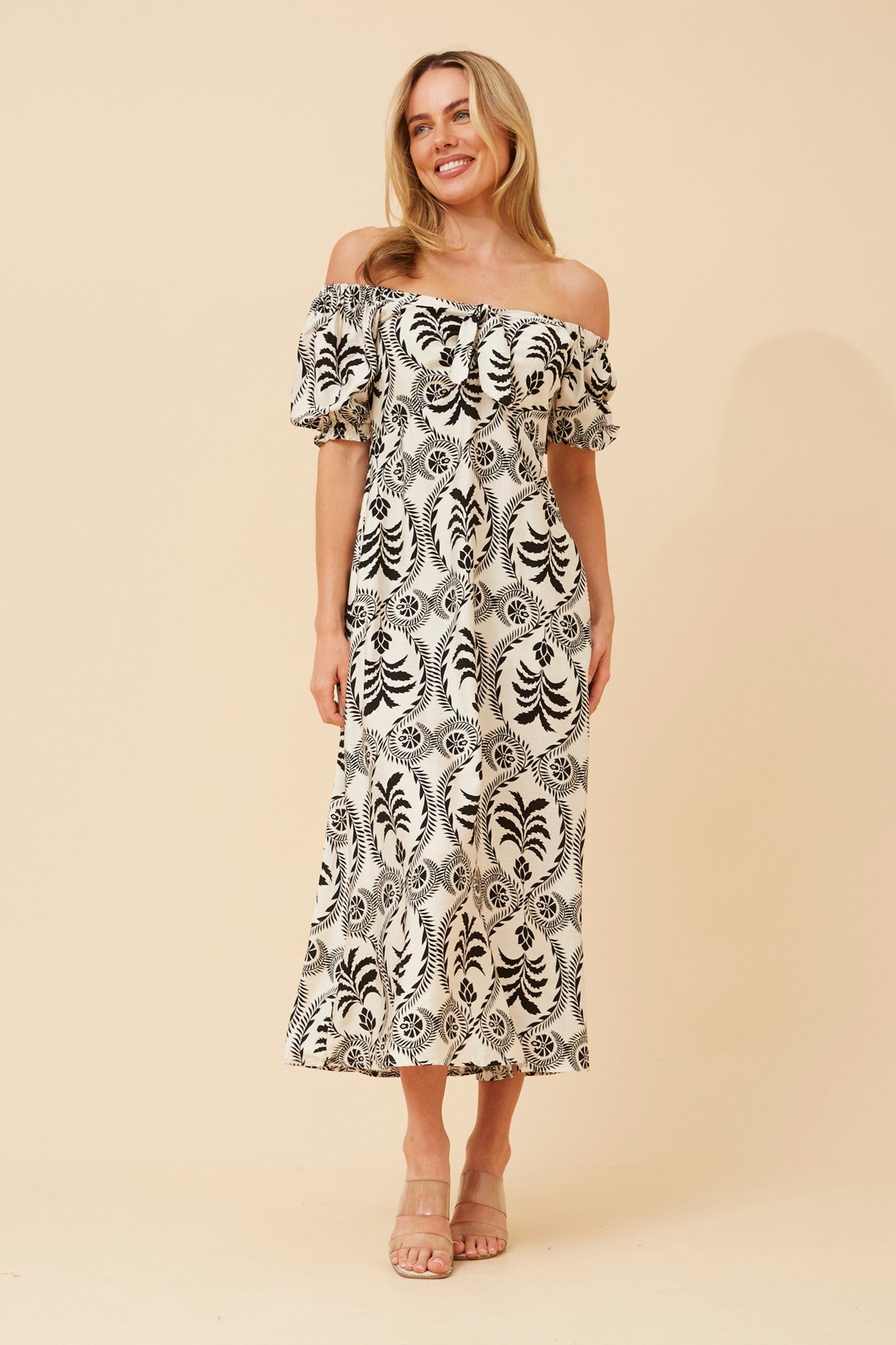 Image of Dresses. Product name - FAITH ABSTRACT MIDI DRESS in White And Black colour by brand - Caroline Morgan Australia