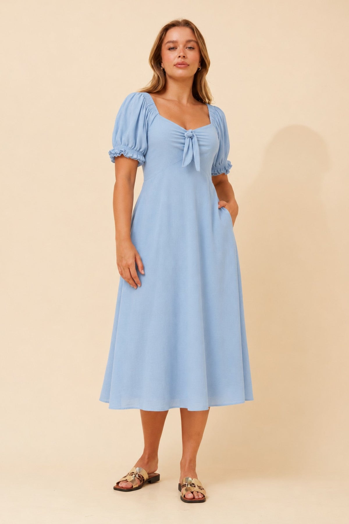 Image of Dresses. Product name - FAITH BOW FRONT DRESS in Jade colour by brand - Caroline Morgan Australia