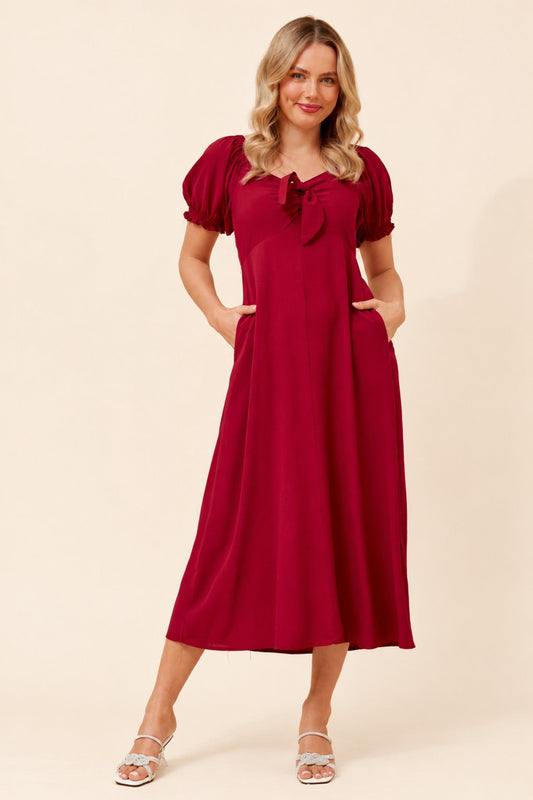 Image of Dresses. Product name - FAITH BOW FRONT DRESS in Red colour by brand - Caroline Morgan Australia