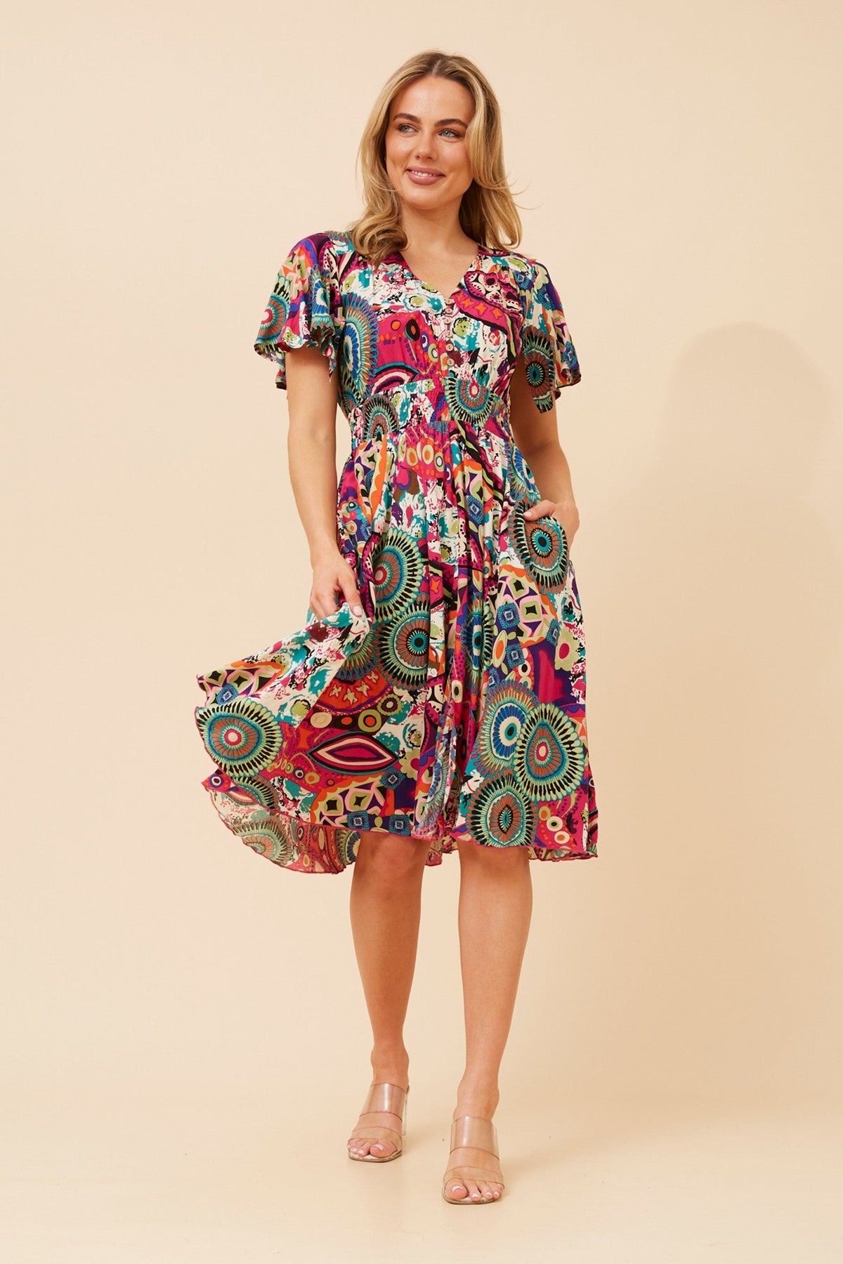 Image of Dresses. Product name - SANDY ABSTRACT PRINT DRESS in Multi Pink colour by brand - Caroline Morgan Australia