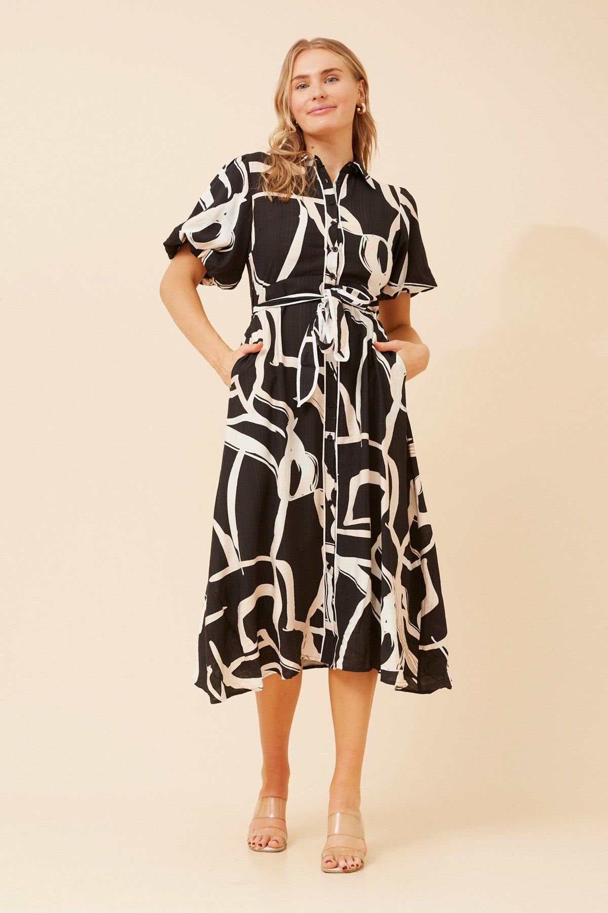 Image of Dresses. Product name - ESSIE ABSTRACT PRINT MIDI DRESS in Black colour by brand - Caroline Morgan Australia
