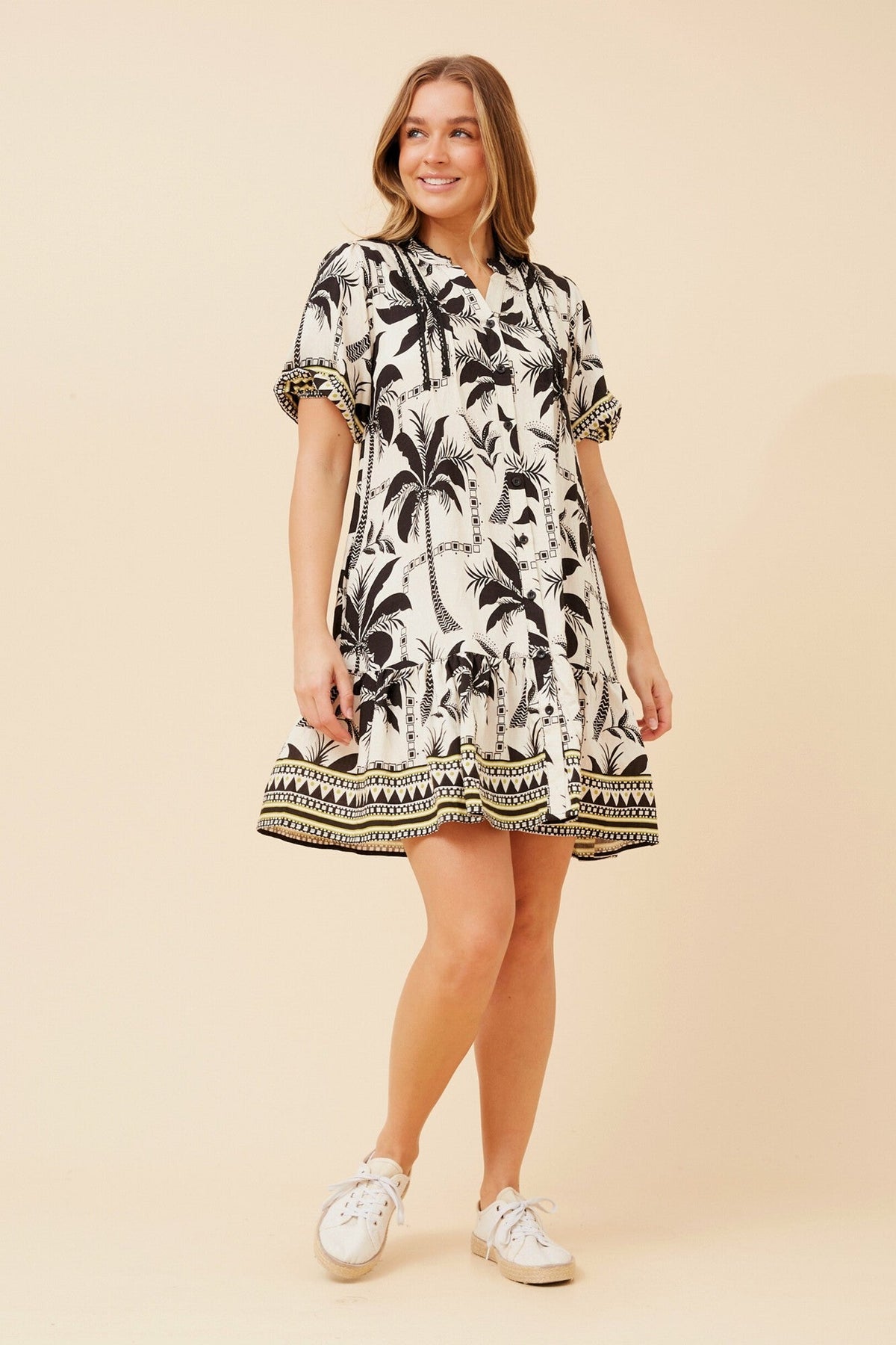 Image of Dresses. Product name - NIXA TROPICAL PRINT DRESS in Black colour by brand - Caroline Morgan Australia