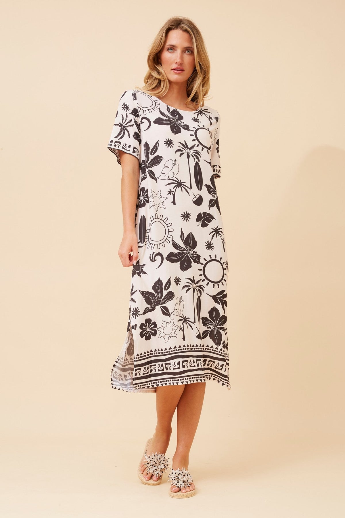 Image of Dresses. Product name - ZORIKA BORDER PRINT DRESS in Ivory colour by brand - Caroline Morgan Australia