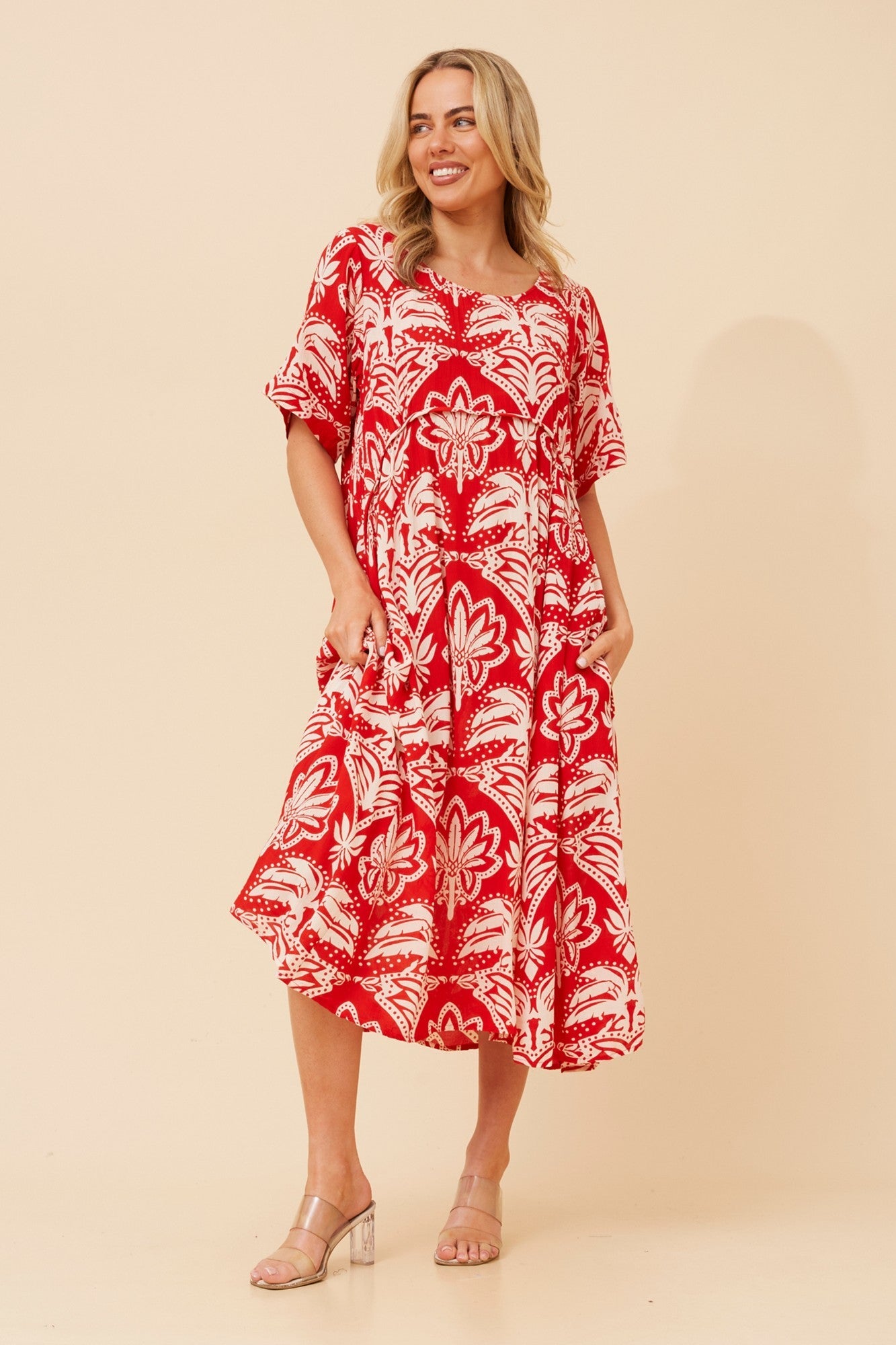 Image of Dresses. Product name - CARLA LEAF PRINT MIDI DRESS in Red colour by brand - MYSTIC MONSOON