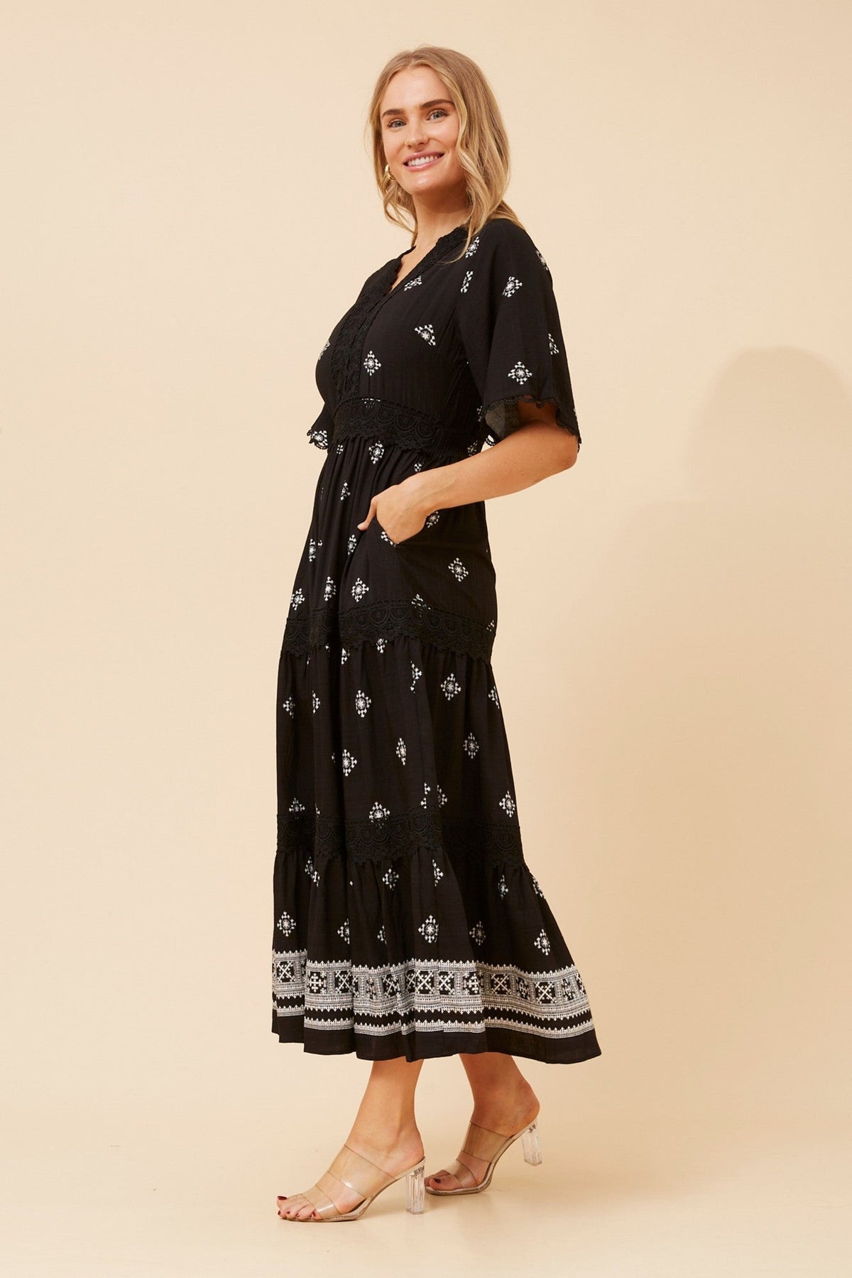 Image of Dresses. Product name - GEENA BORDER PRINT MAXI DRESS in Black colour by brand - Caroline Morgan Australia