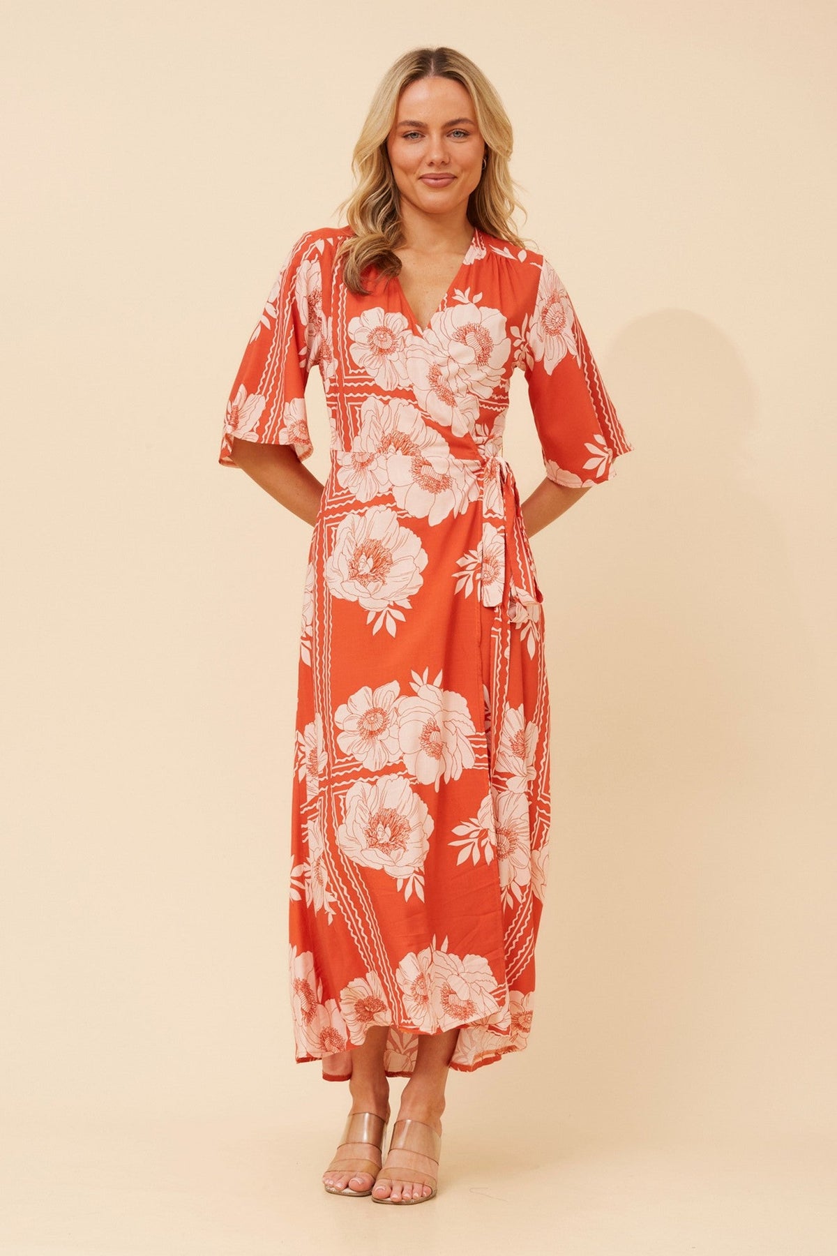 Image of Dresses. Product name - AVALON FLORAL LINEN BLEND DRESS in Desert Orange colour by brand - Caroline Morgan Australia