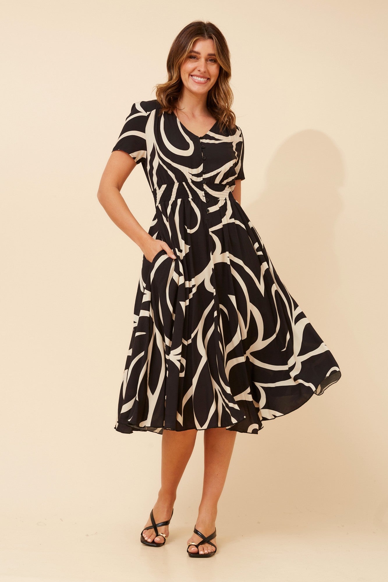 Image of Dresses. Product name - KEGAN ABSTRACT PRINT MIDI DRESS in Black/Beige colour by brand - Caroline Morgan Australia